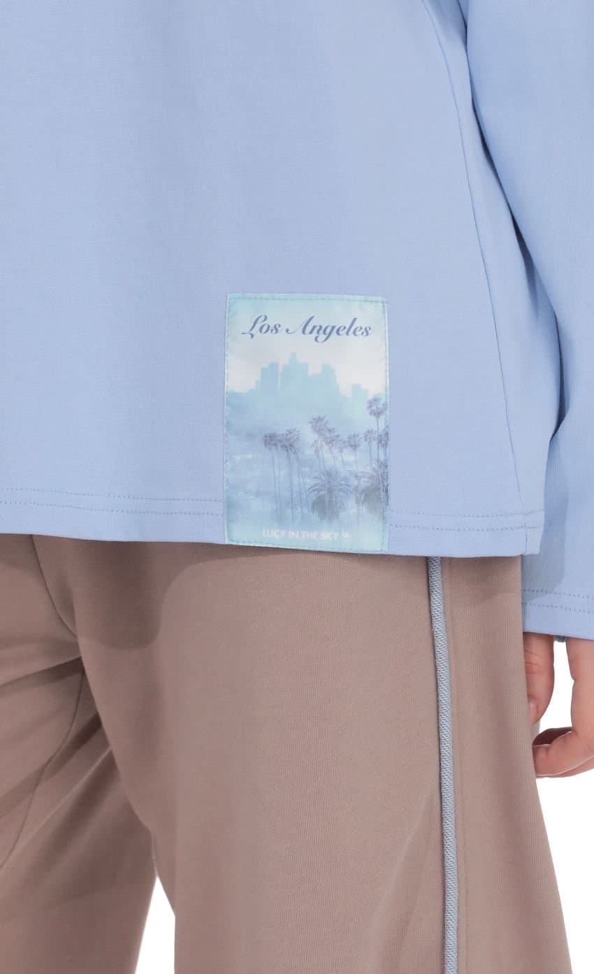 Lucy Graphic Crewneck Shirt in Light Blue