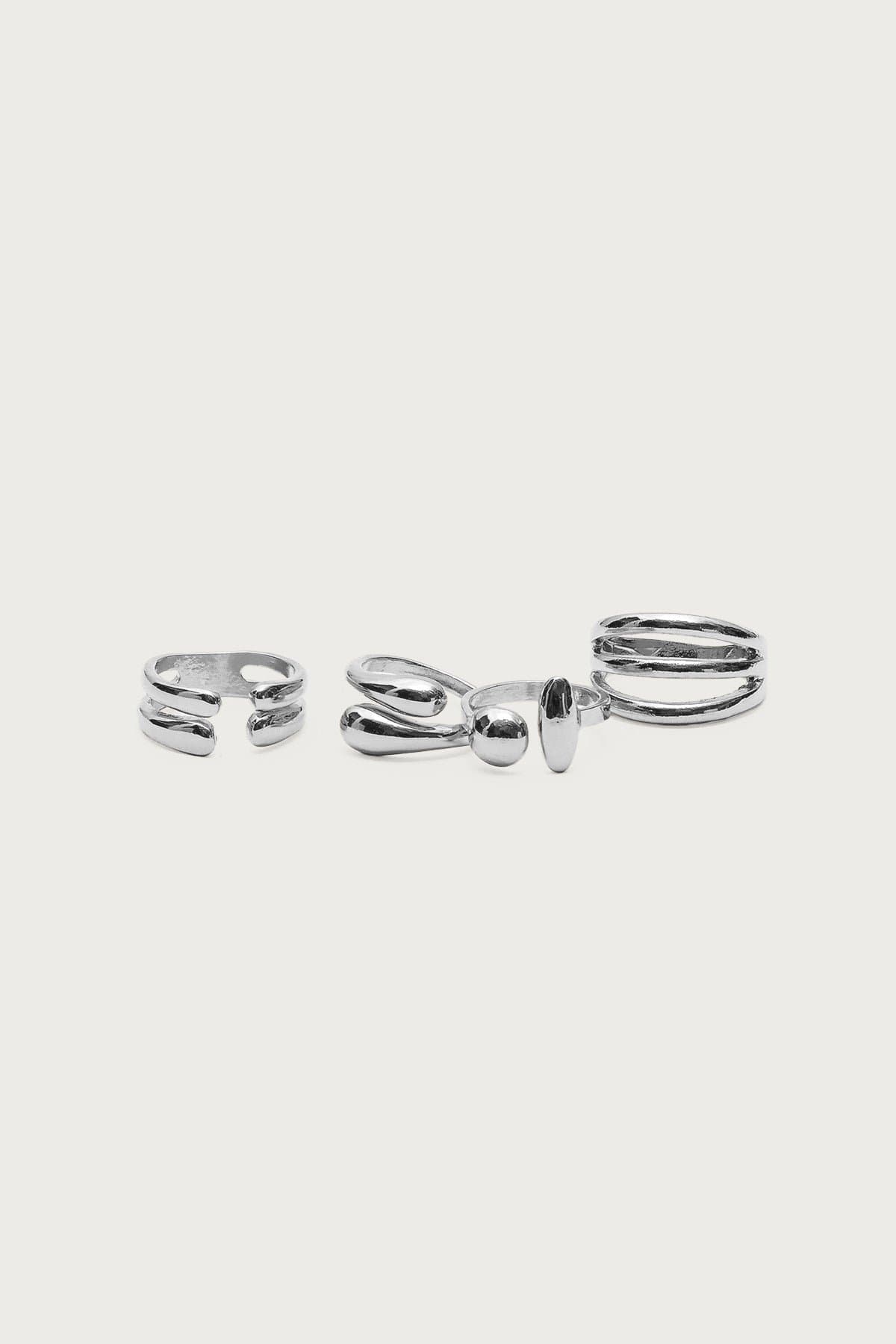 Mixed Ring Pack - 4 Assorted Styles Silver Tone Metal 0.7-0.8in Diameter