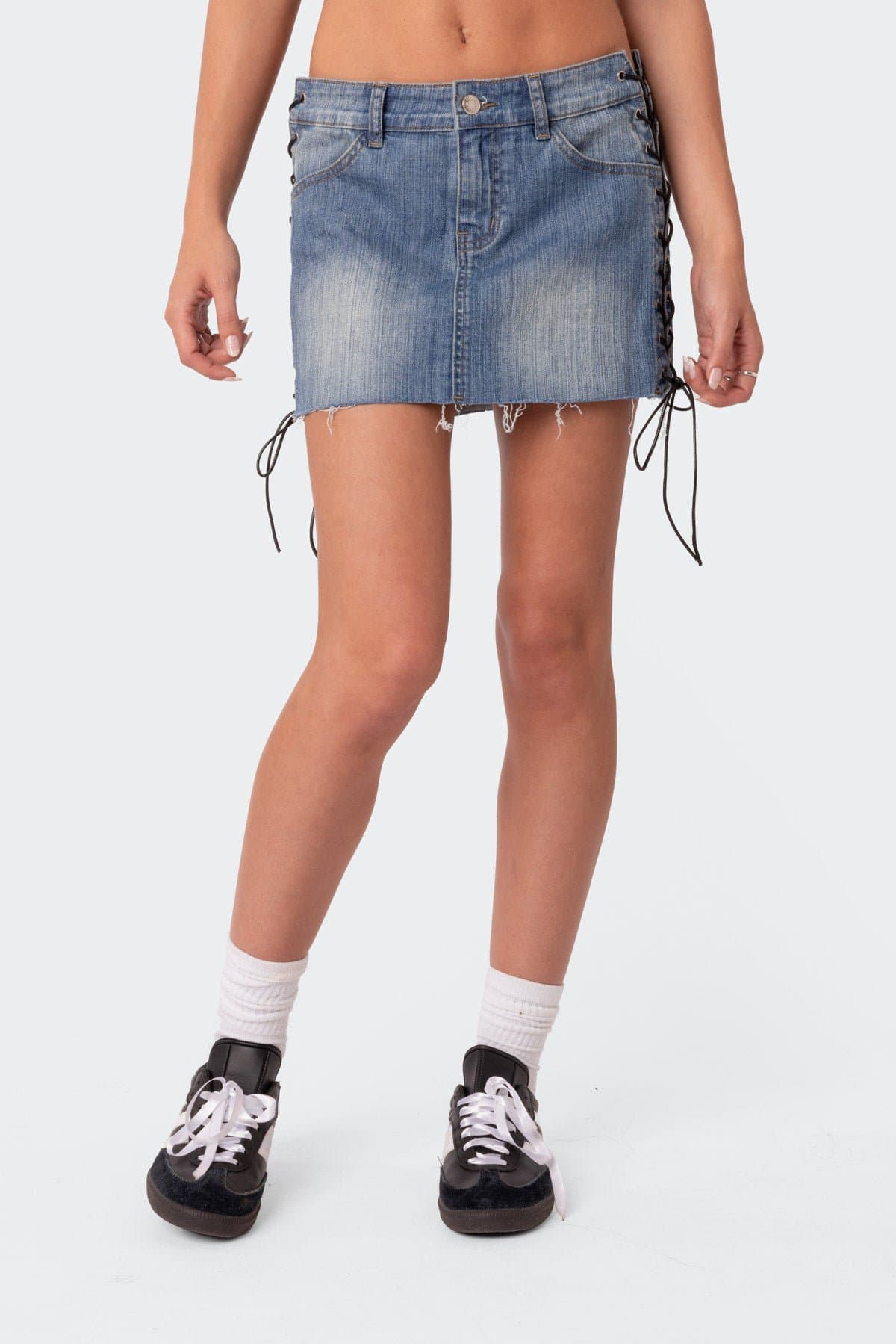 Side Lace Up Denim Mini Skirt in Cotton Spandex with Raw Hem