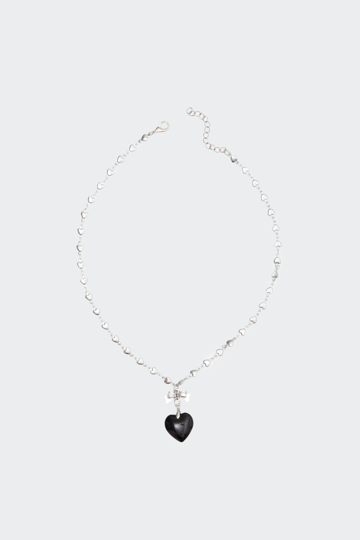 Heart Pendant Bow Necklace in Silver Tone Metal