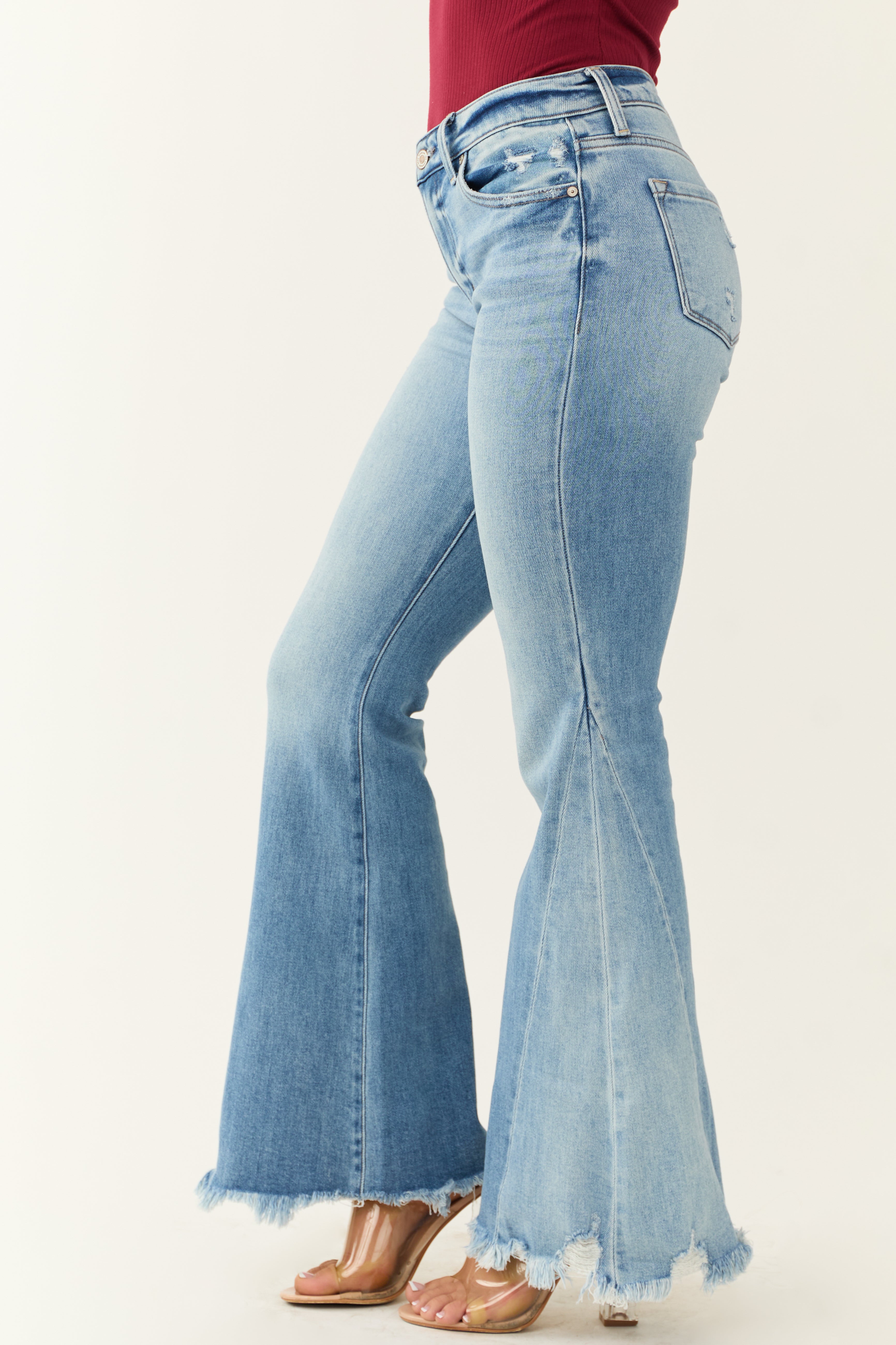 Womens Medium Light Wash Flare Jeans with Sharkbite Hem